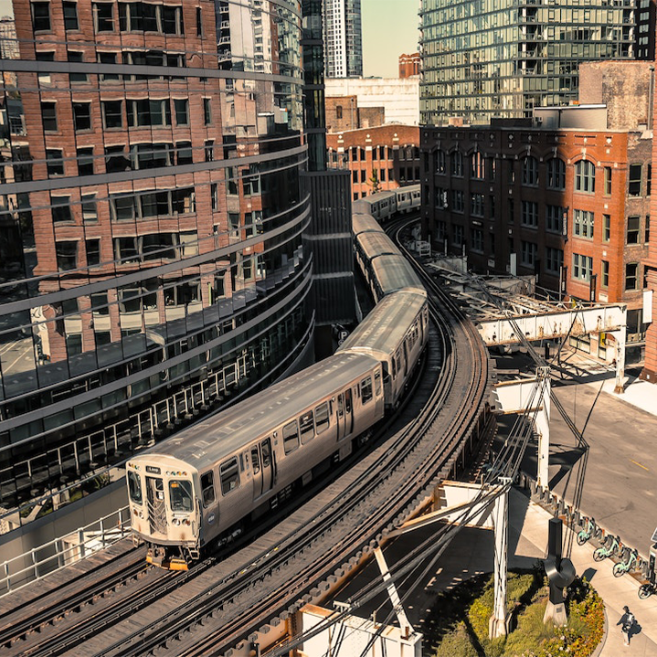 The Chicago Transportation Authority’s “L” train, traveling between skyscrapers in downtown Chicago. Image credit: Photo by Ramapasha Laksono