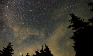 A meteor streaks across the sky during the annual Perseid meteor shower, Wednesday, August 11, 2021, in Spruce Knob, West Virginia. Image Credit: NASA/Bill Ingalls